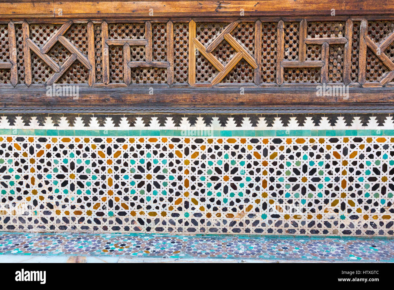 Fes, Morocco.  Medersa Bou Inania, Decorative Tile and Woodwork. Stock Photo