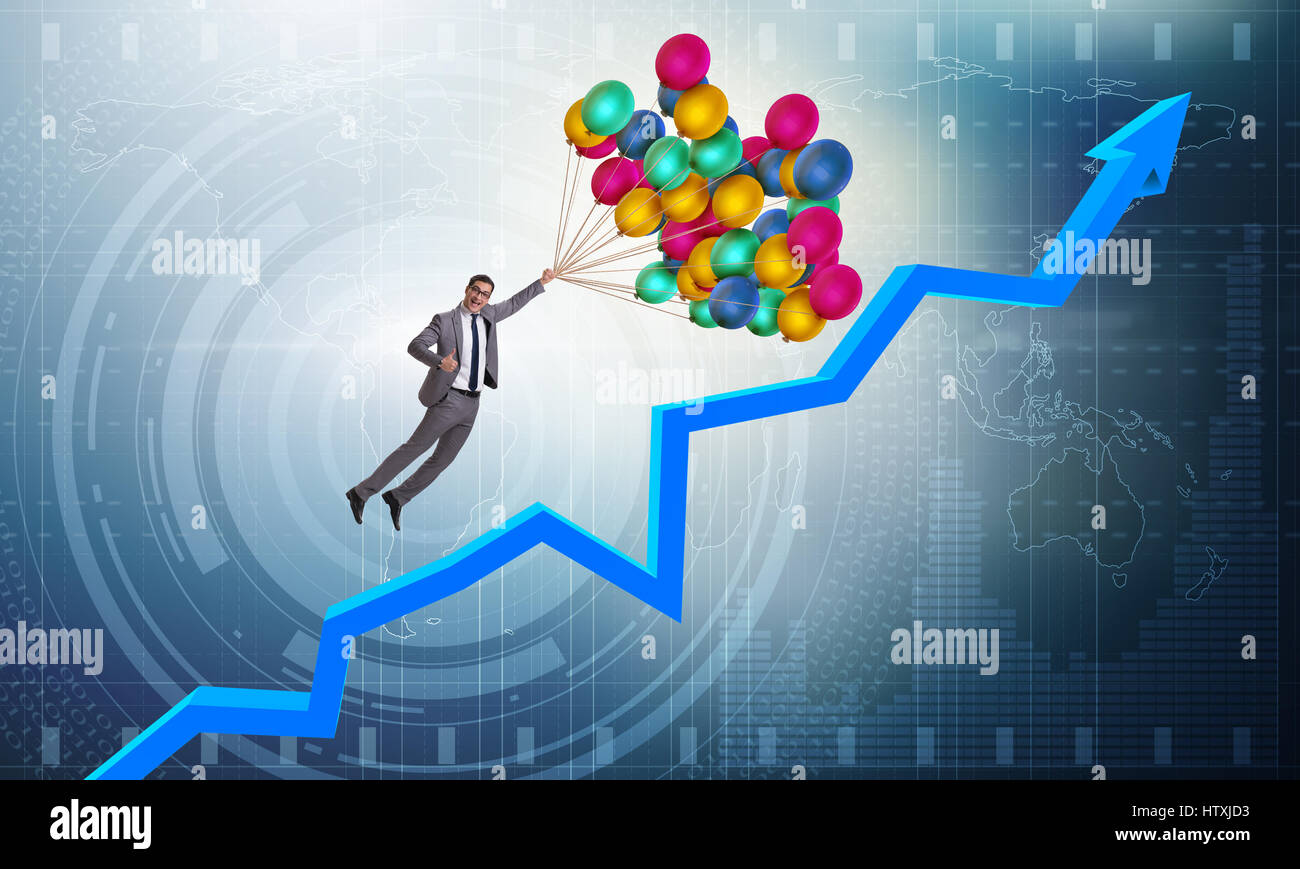 Graph Balloons Rising Businessman flying on balloons over graph Stock Photo - Alamy