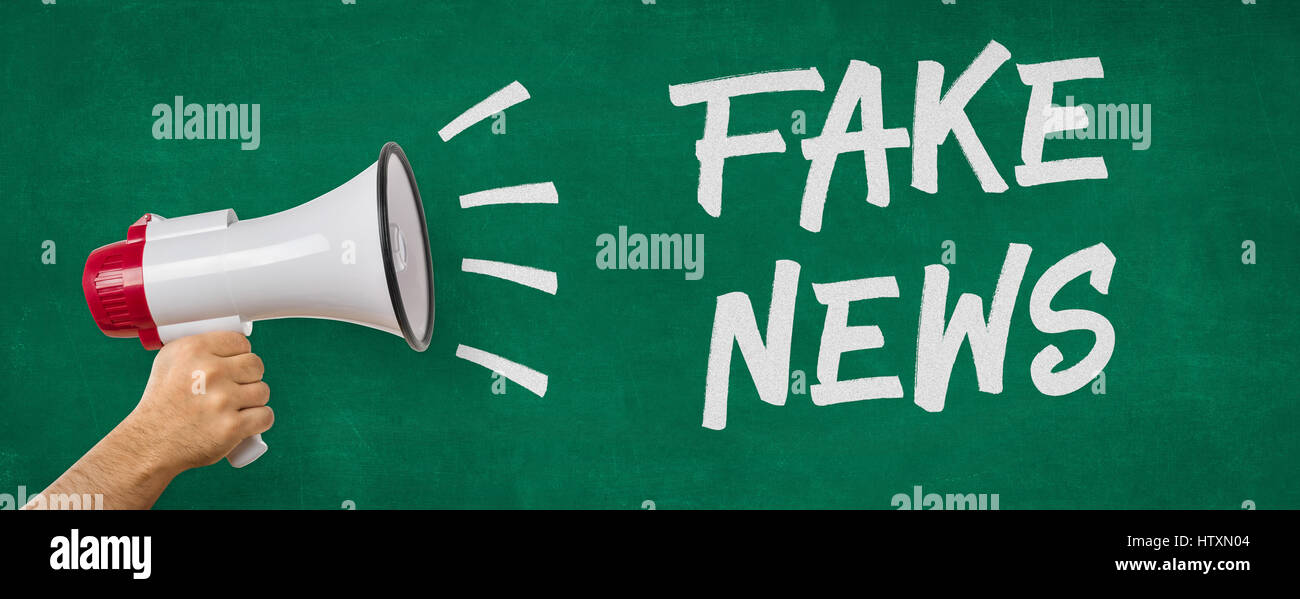 A man holding a megaphone - Fake News Stock Photo - Alamy