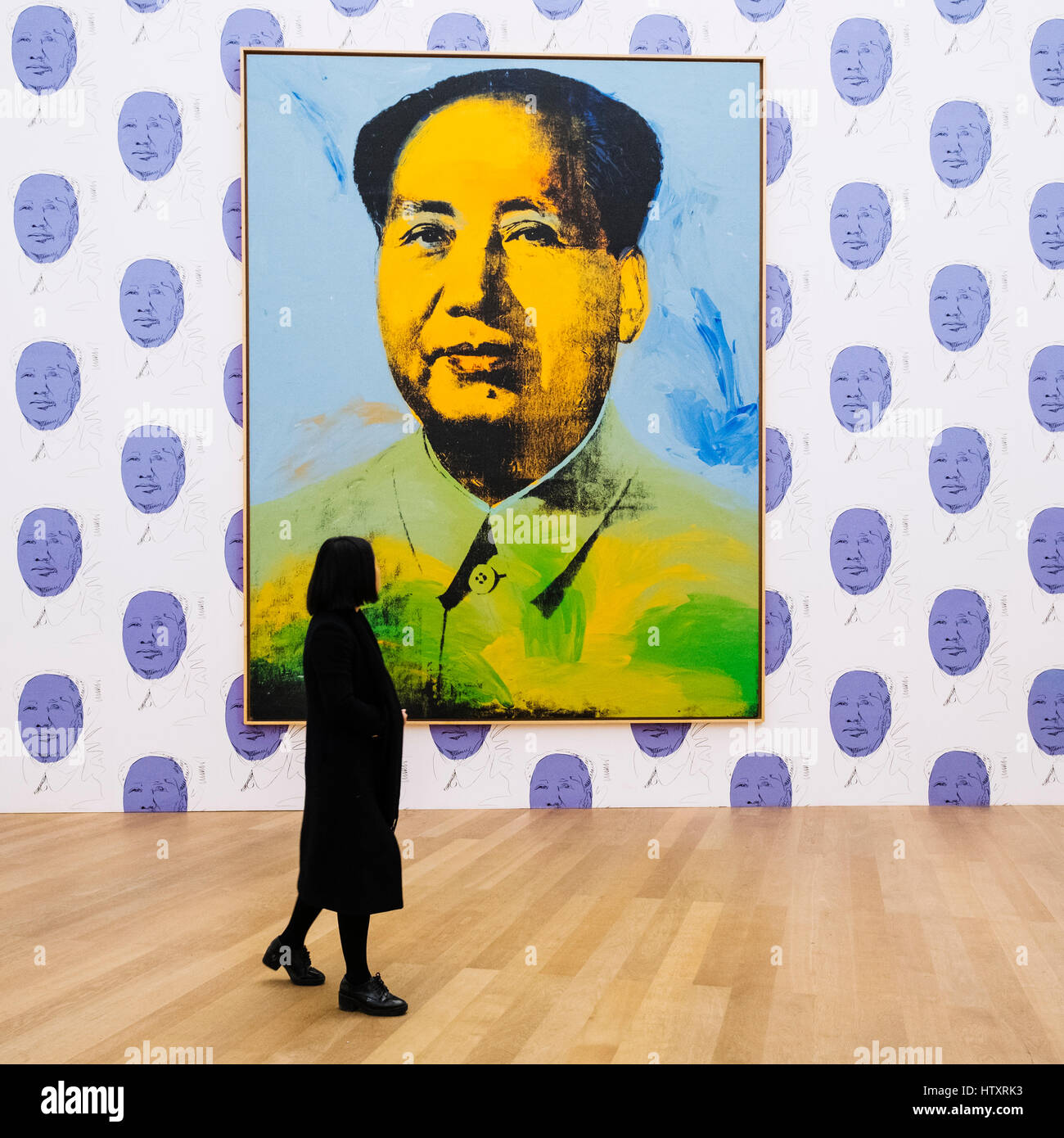 Woman looking at painting Mao by Andy Warhol at Hamburger Bahnhof modern art museum in Berlin, Germany Stock Photo