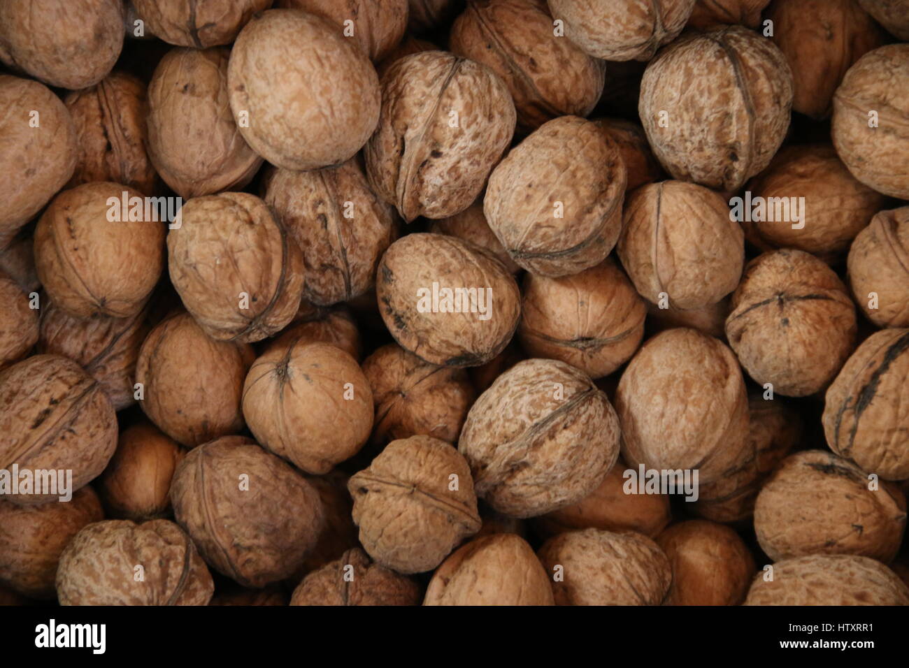 Walnuts. Healthy organic food concept. Top view. Blurred photo for