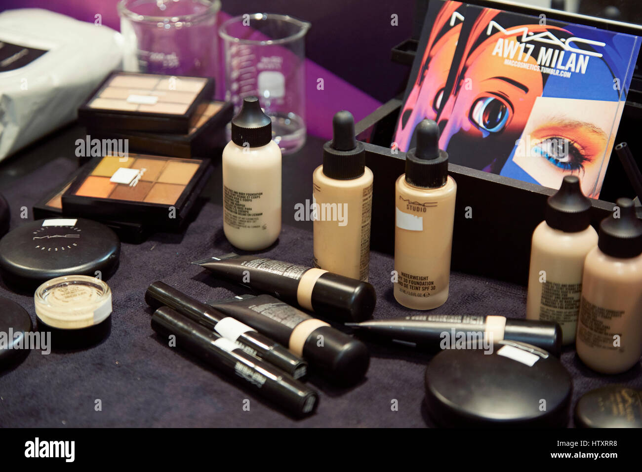 Mart inkompetence talentfulde Mac cosmetics sponsor at Milan fashion week: assorted facial and eye  products on the black make-up table and chair Stock Photo - Alamy