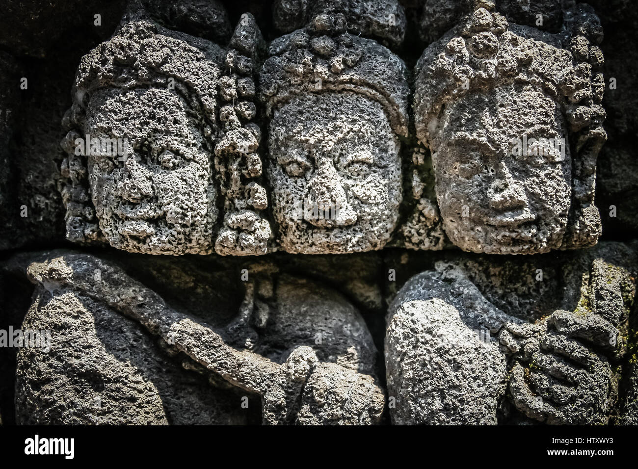 Details of sculptures and reliefs on the walls of the Borobudur temple ...