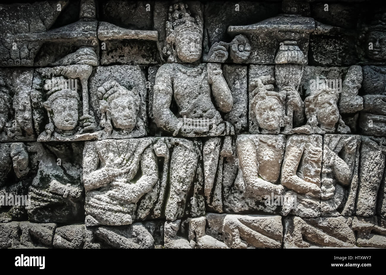 Details of sculptures and reliefs on the walls of the Borobudur temple ...