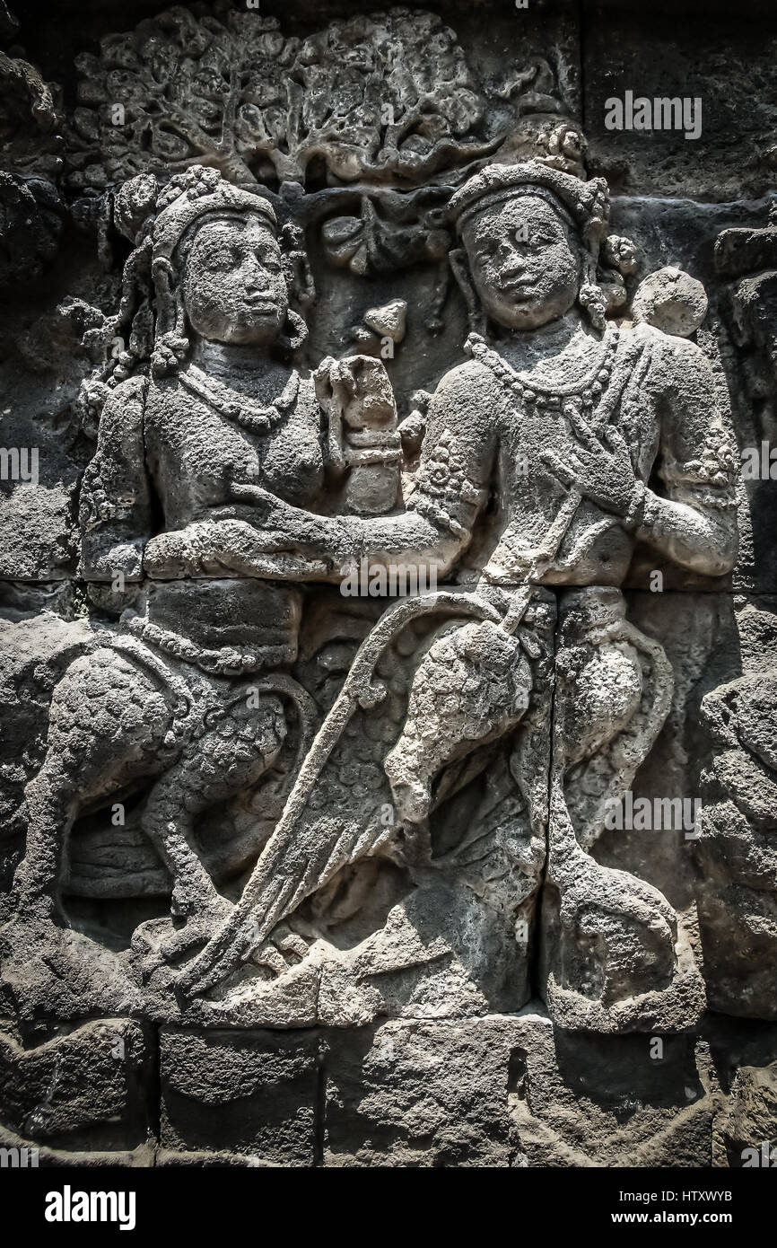 Details of sculptures and reliefs on the walls of the Borobudur temple ...