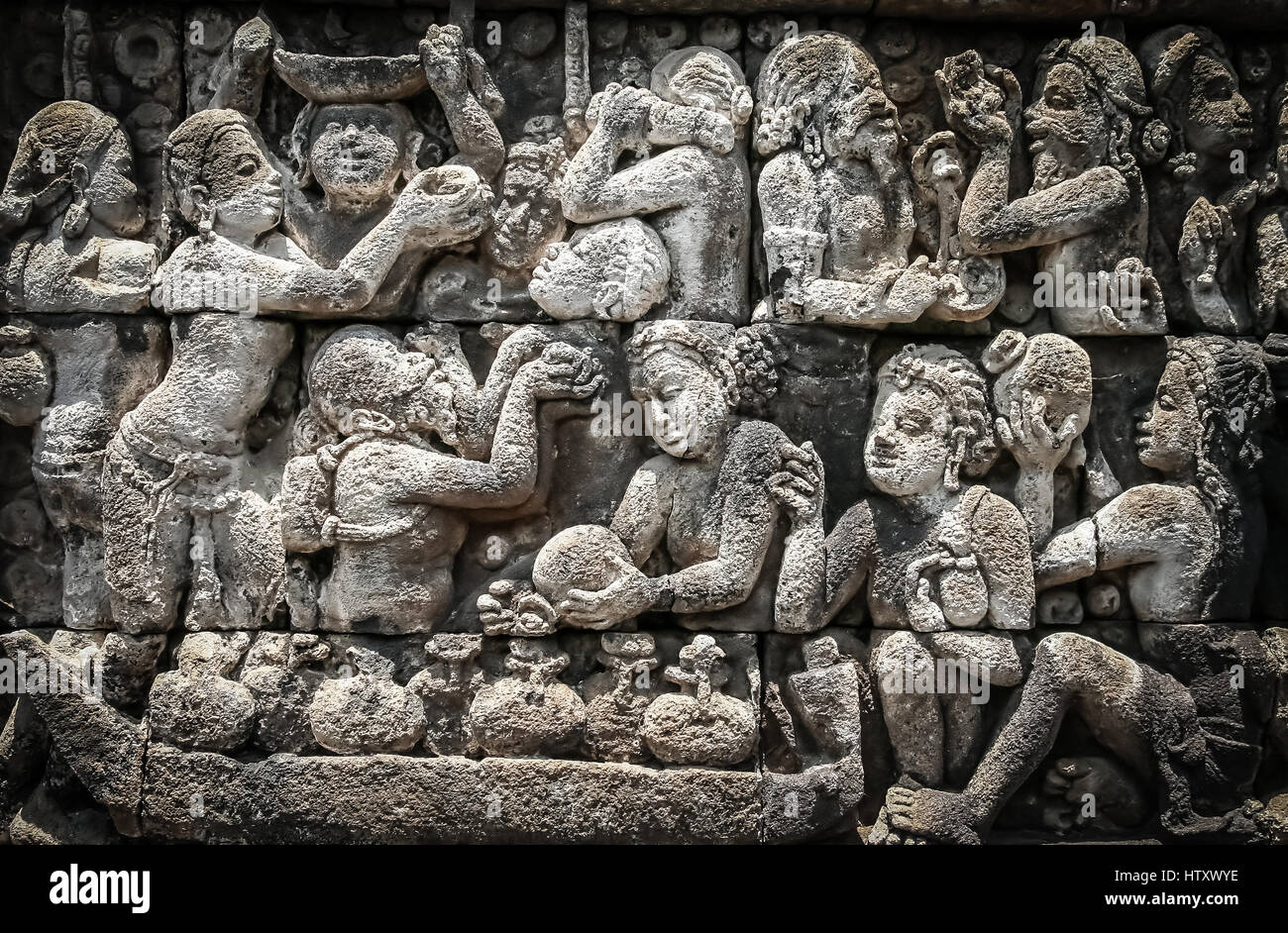 Details of sculptures and reliefs on the walls of the Borobudur temple ...