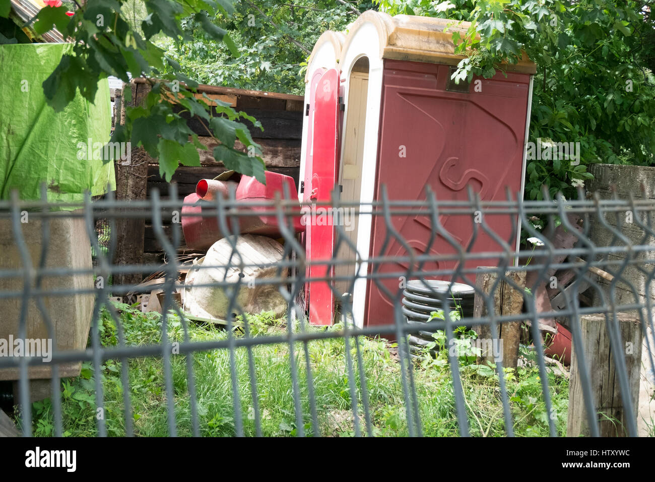 Garden furniture and portable toilets at Busteni railroad station, Romania Stock Photo