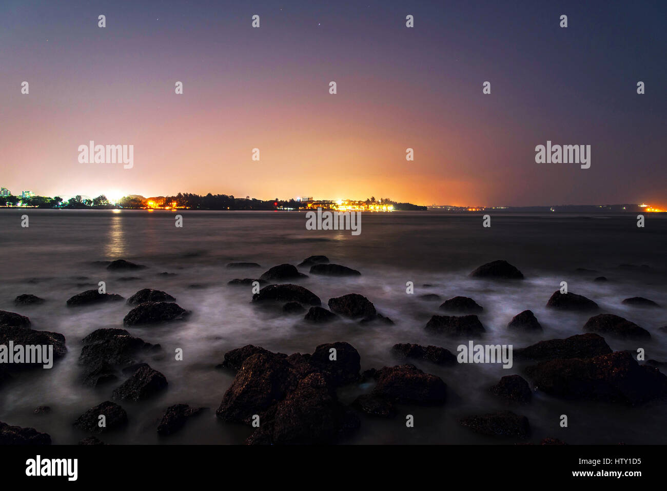 Night View of the rocky river from one of the beautiful beaches in Goa, India Stock Photo