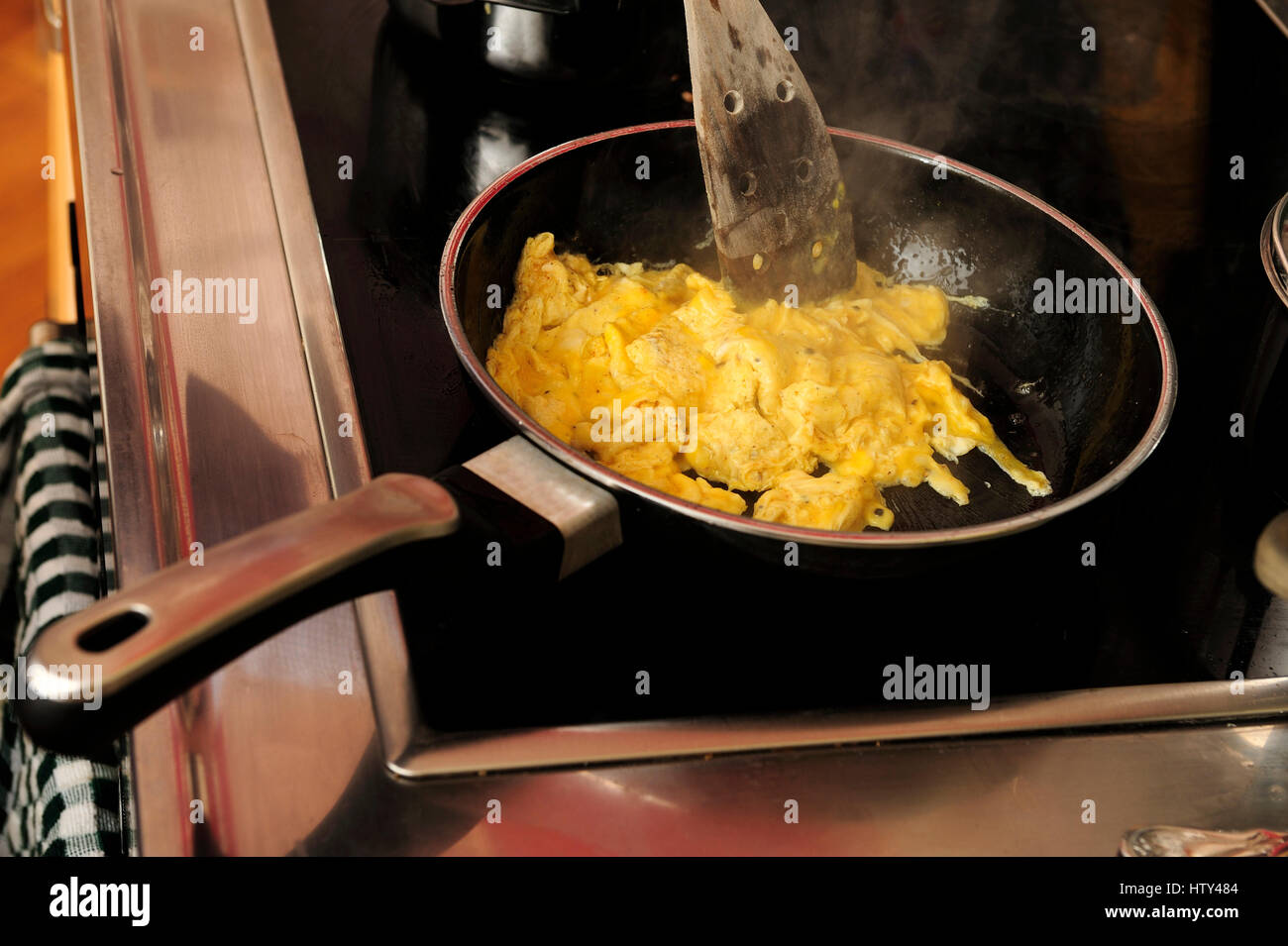 breakfast, scrambled eggs, frying, cooking, kitchen, stove, eggs, protein, proteins, frying pan, hot, warm, meal, Stock Photo