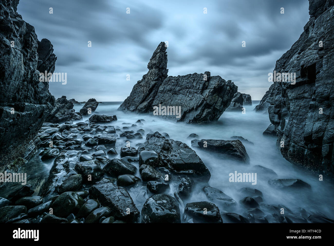 Rock formation at Crescent Head from a nearby ocean cave, on the east coast of NSW, Australia. Long exposure. Stock Photo
