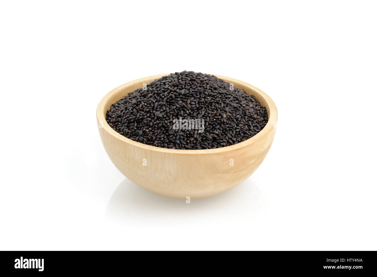 closeup heap of sweet basil seeds isolated on white background Stock ...