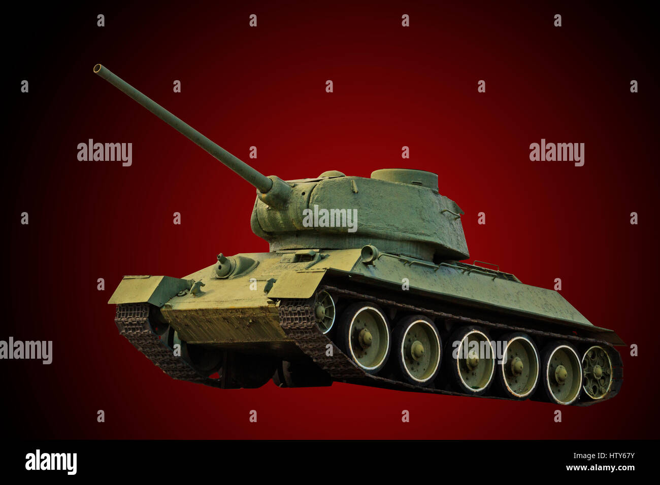 real military tank on a red background,war, heavy equipment, gun, second world war, the Soviet Union, T-34, armor, May 9, Victory Day Stock Photo