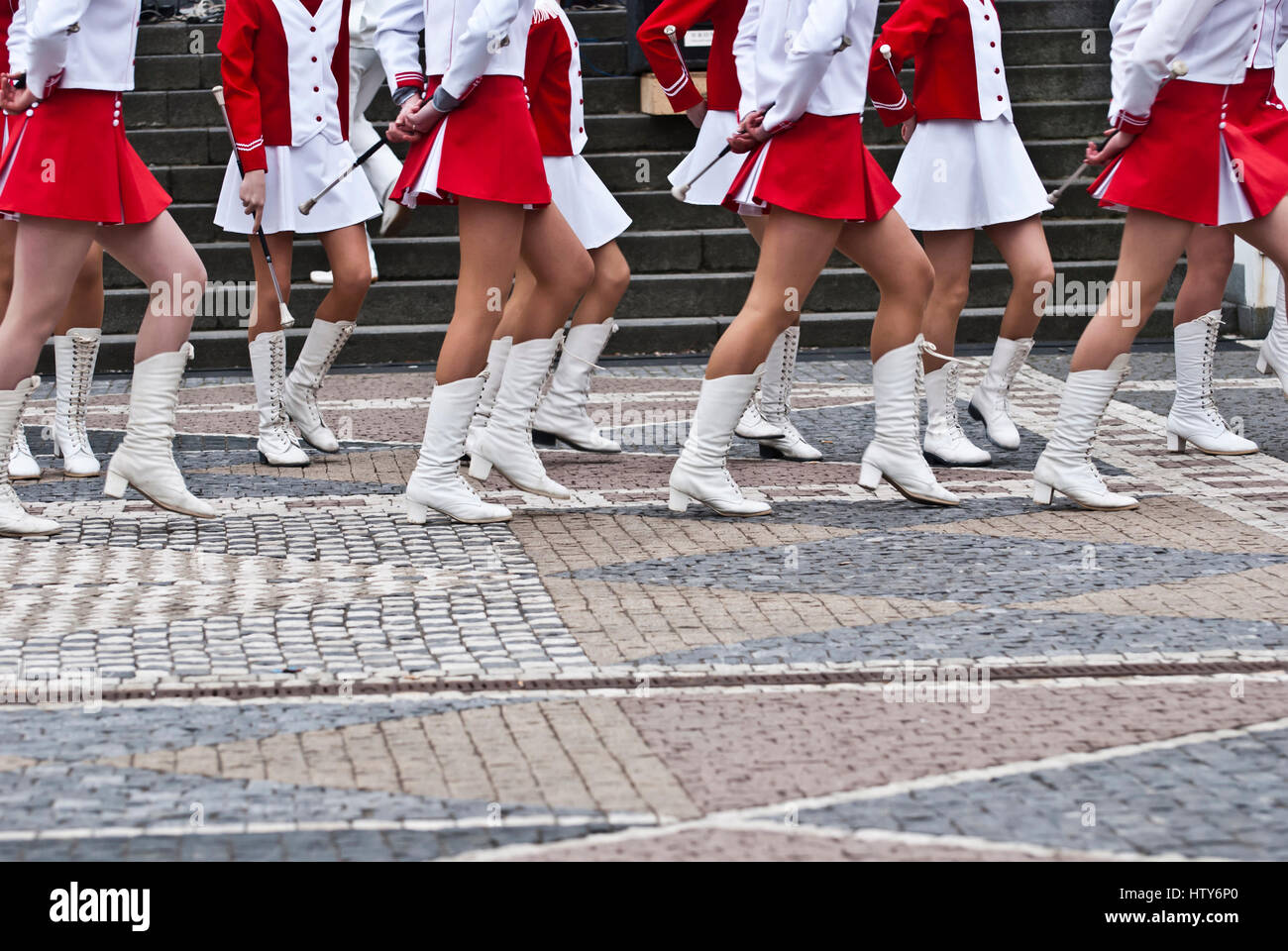 legs of a group of majorettes marching Stock Photo Alamy