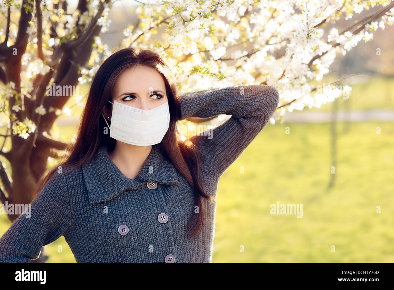Woman with Respirator Mask Fighting Spring Allergies Outdoor Stock