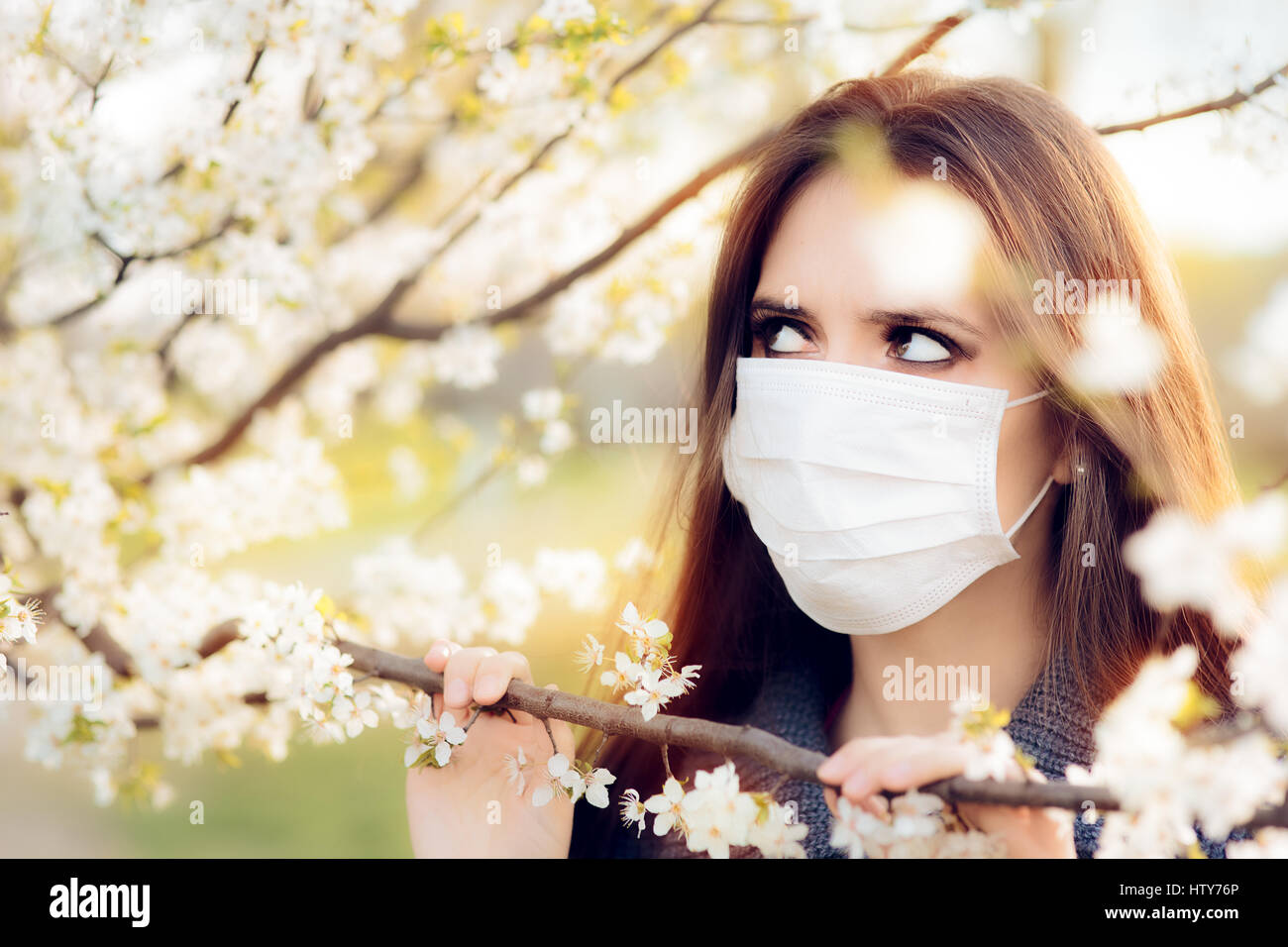 Woman with Respirator Mask Fighting Spring Allergies Outdoor Stock