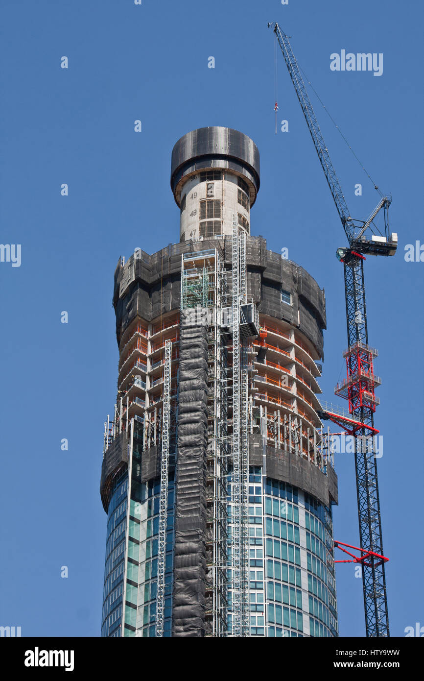 St George Wharf Tower a residential skyscraper under construction in May, 2012 in Vauxhall, London. Picture of upper floors. Stock Photo