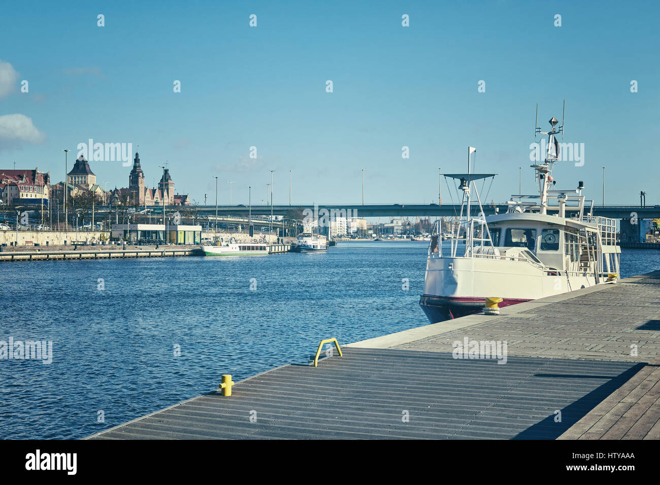 Retro stylized picture of Szczecin (Stettin) city waterfront, Poland. Stock Photo