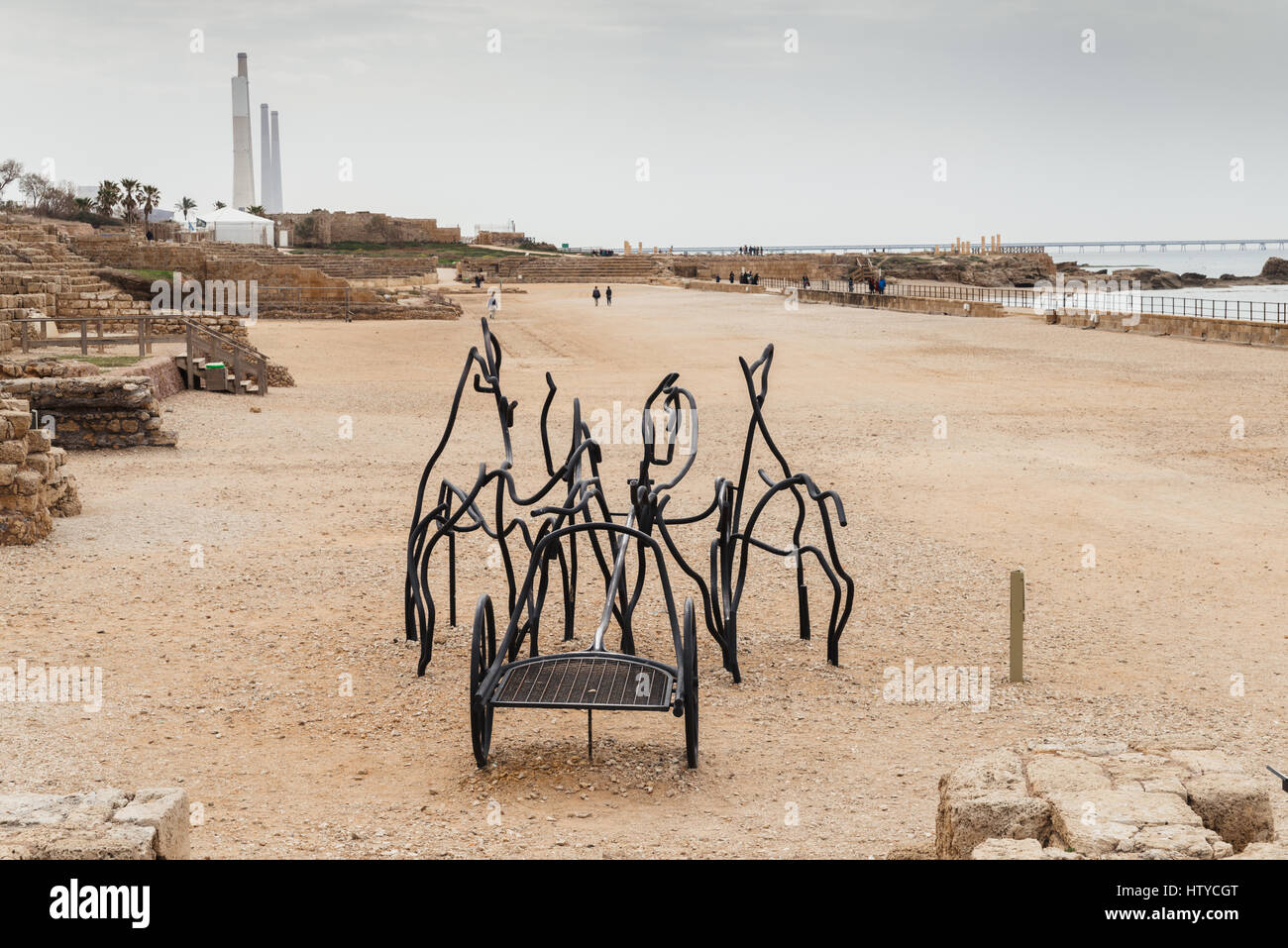 A modern steel sculpture of two horses and a chariot at the Roman Hippodrome in Caesarea, Israel Stock Photo