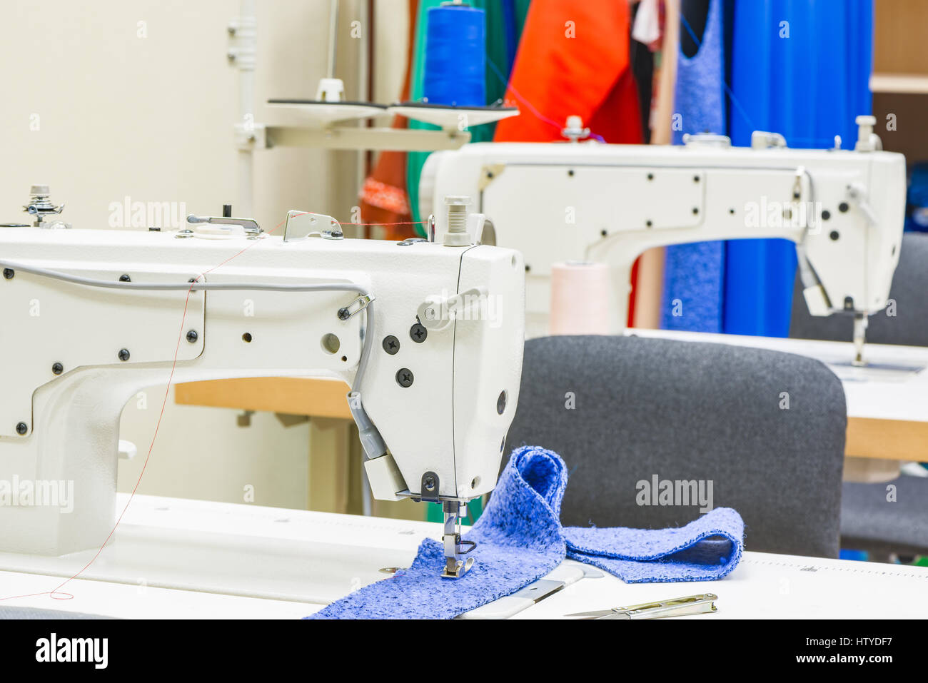 Sewing machine in the atelier room. Stock Photo