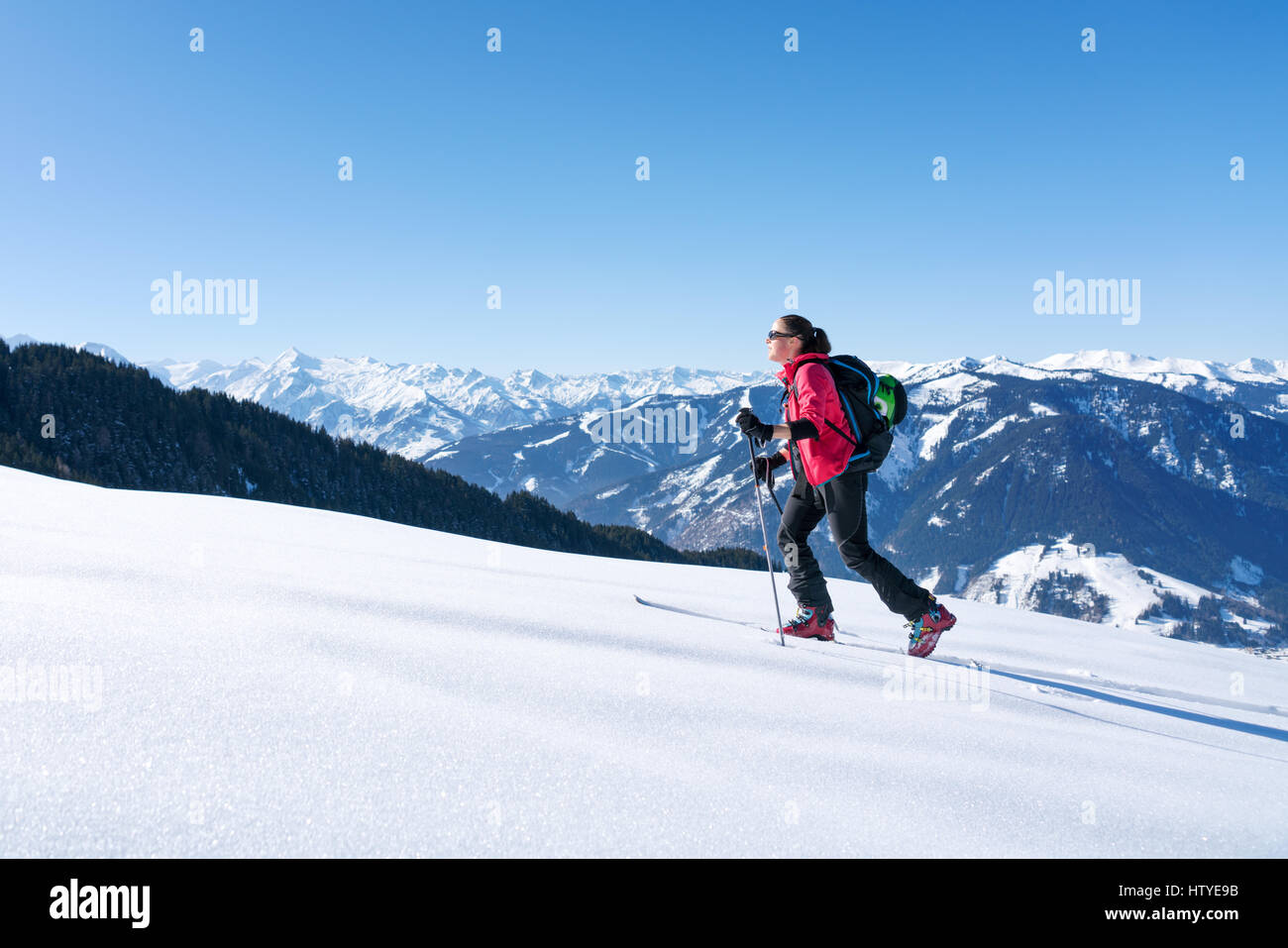 Woman cross-country skiing, Zell am see, Salzburg, Austria Stock Photo