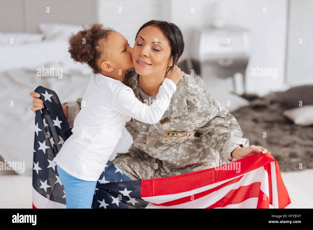 Patriotic young lady happy being home Stock Photo