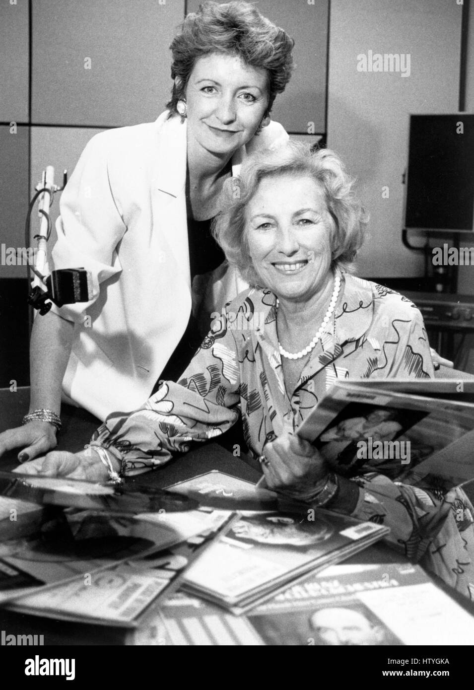 Broadcaster Sue Lawley (l) and Dame Vera Lynn in the studio on Radio 4's Desert Island Discs. Stock Photo