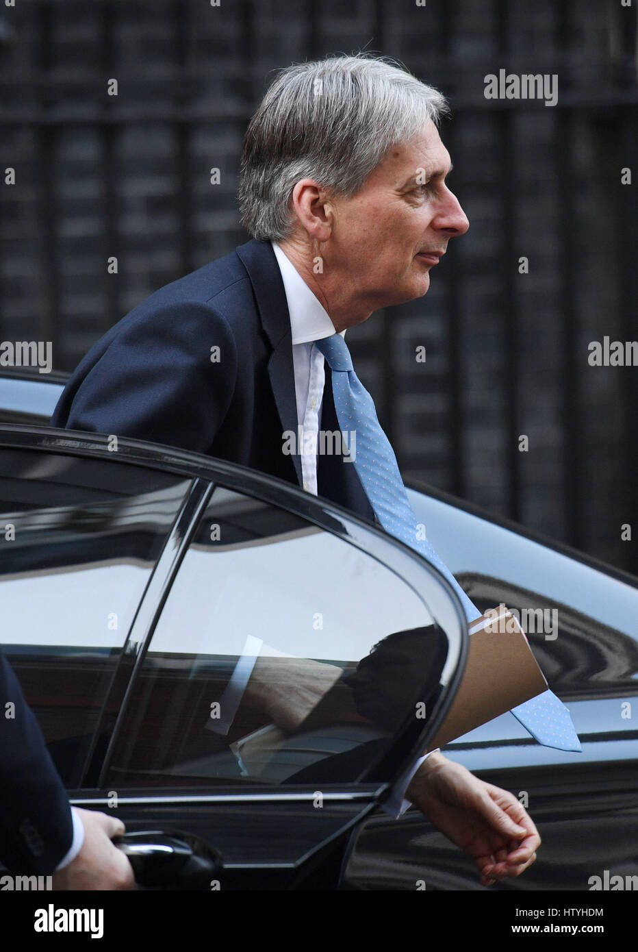 Chancellor Philip Hammond arrives back in Downing Street, London, after he committed a dramatic U-turn over his planned Budget hike in National Insurance Contributions (NICs) for the self-employed. Stock Photo