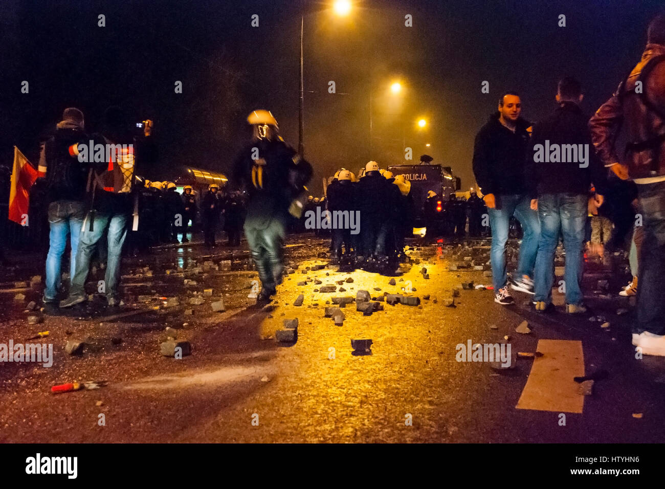 WARSAW, POLAND - NOVEMBER 11: Protests and riots at night during polish Independence day in Warsaw in November 11, 2014 Stock Photo