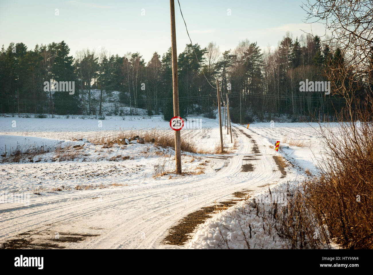 Road trough norwegian contryside in snowy winter afternoon Stock Photo