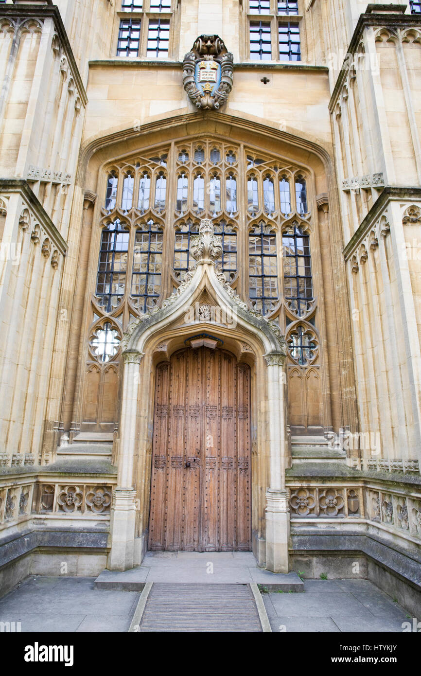 Decorative wooden doors to the Divinity College Oxford Stock Photo Alamy