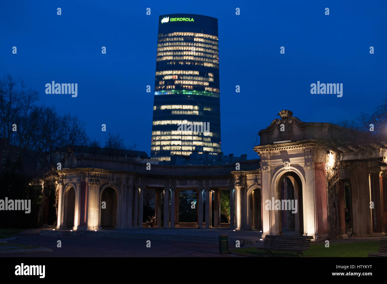 Bilbao: the Iberdrola Tower, headquarter of the electricity company designed by Cesar Pelli, the tallest building in the Basque Country, seen at night Stock Photo