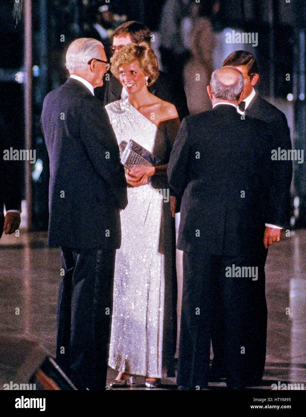 Princess Diana departs the National Gallery of Art in Washington, DC following an evening dinner and reception accompanied by Dr Franklin Murphy, Board Chairman of the National Gallery of Art, and John Stevenson, President of the National Gallery of Art, Stock Photo