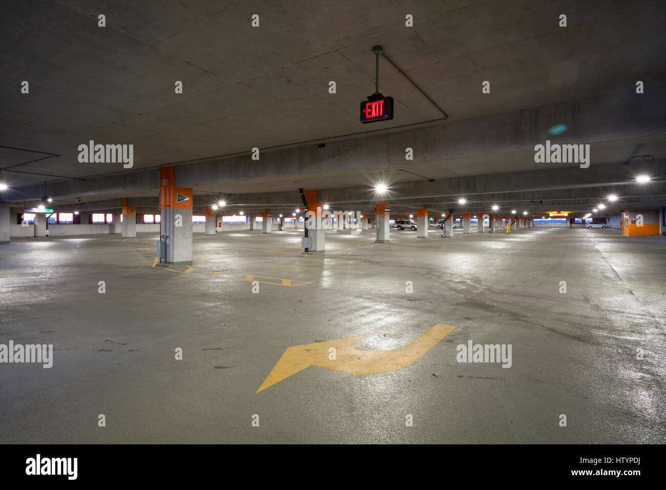A mostly empty parking garage at the Erindale Go Station in Mississauga, Ontario, Canada. Stock Photo