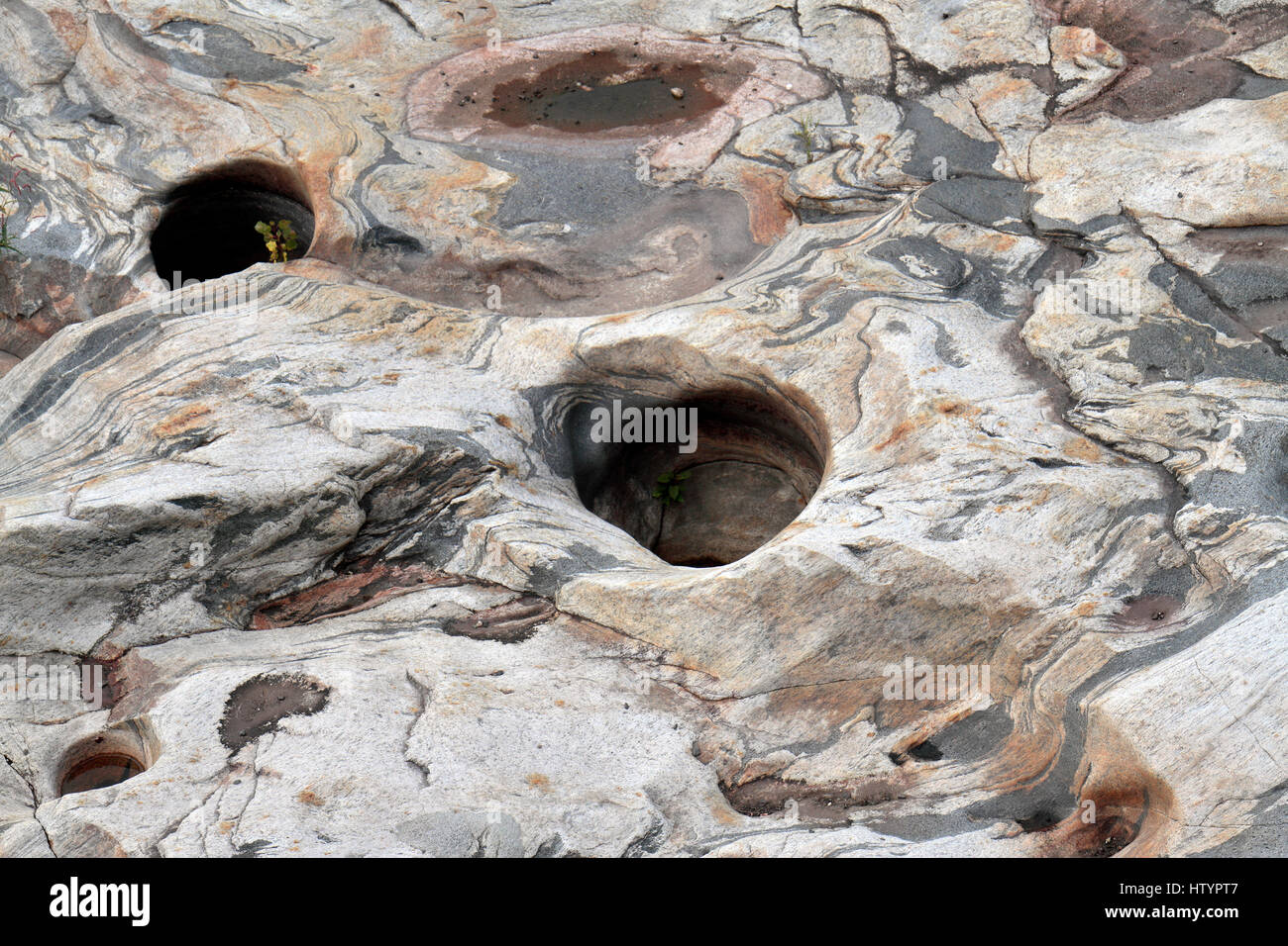 Glacial potholes (a feature of glaciation) on the Deerfield River, Shelburne Falls, Massachusetts. United States. Stock Photo
