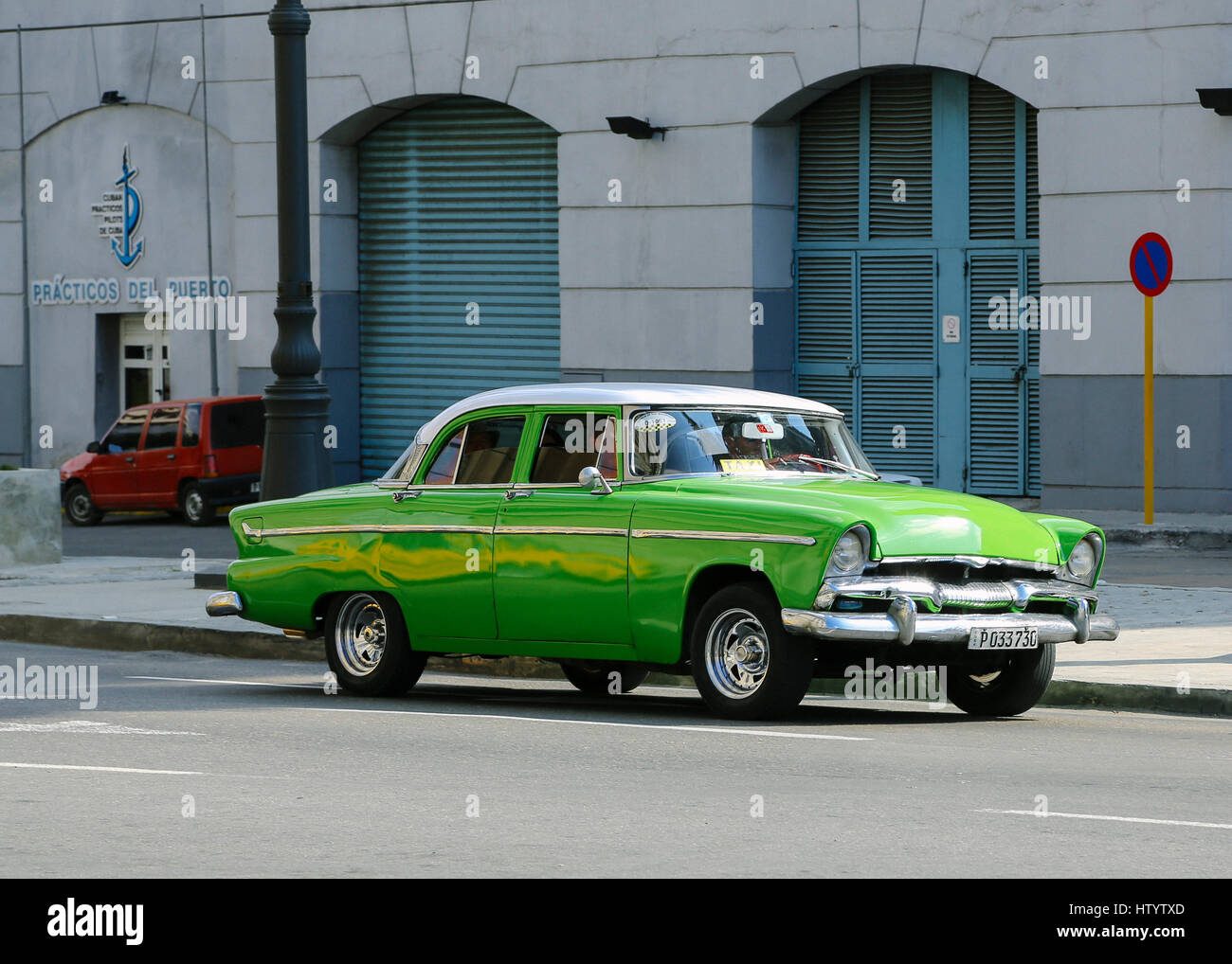 A green American style classic car in Cuba Stock Photo