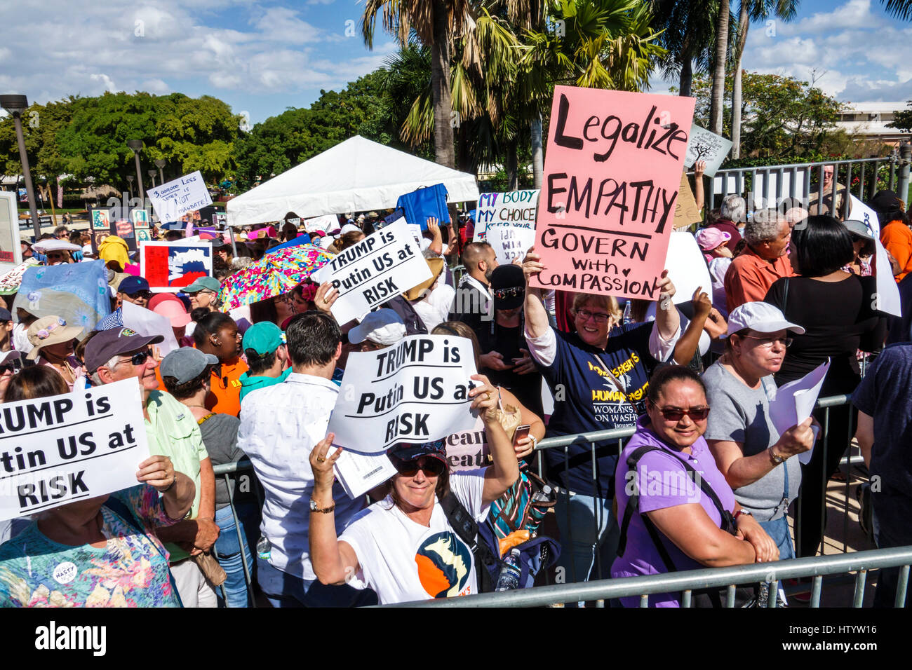 Miami Florida,Downtown,Bayfront Park,Women's March,political protest,march,human rights,advocacy,sign,woman female women,holding sign,protesters,anti- Stock Photo