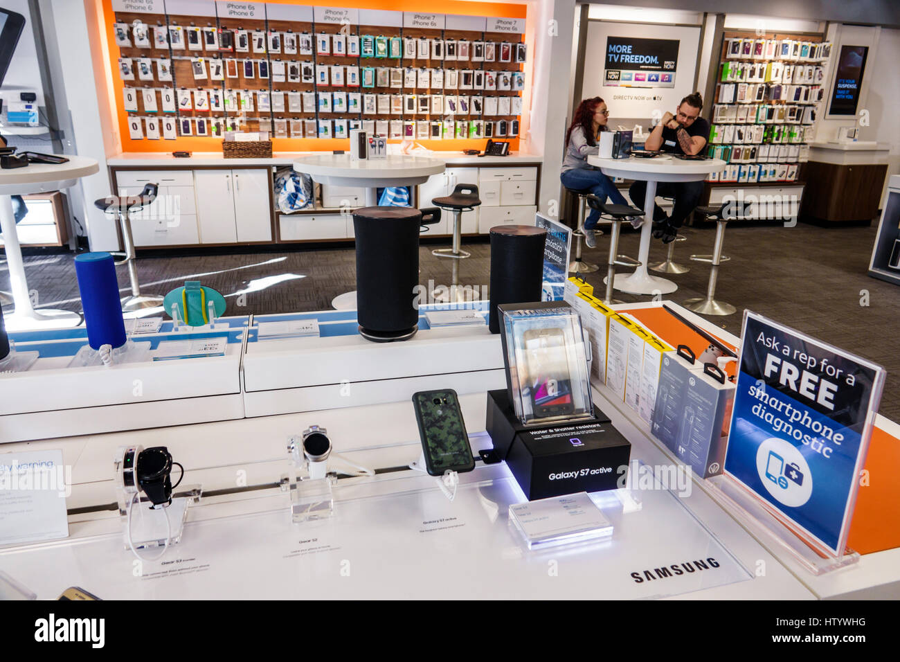 Miami Beach Florida,AT&T Store,store,wireless services,inside interior,smartphone cell phone phones texting,Samsung,tablet,watch,display sale showroom Stock Photo