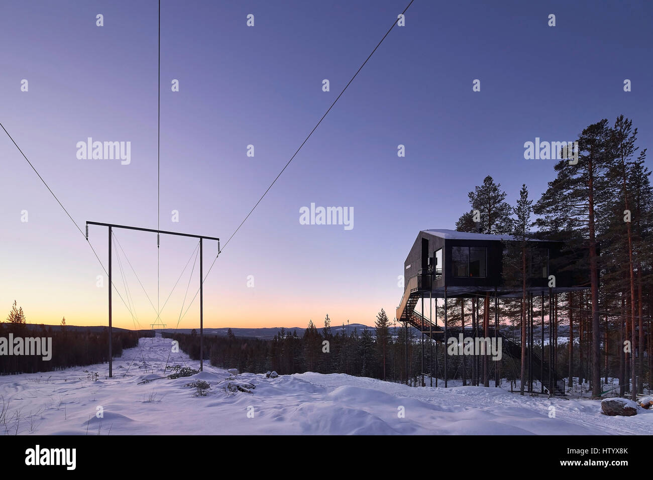Sunset elevation. Treehotel, Harads, Sweden. Architect: various, 2016. Stock Photo