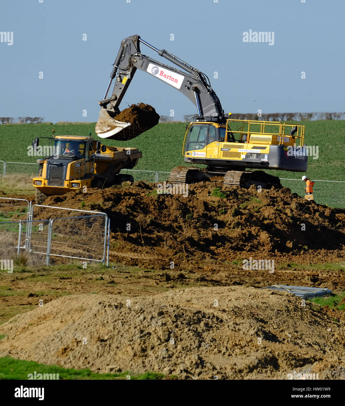 Heavy machinery used in the preparation of land for house building, Grantham Lincolnshire, England, UK. Stock Photo