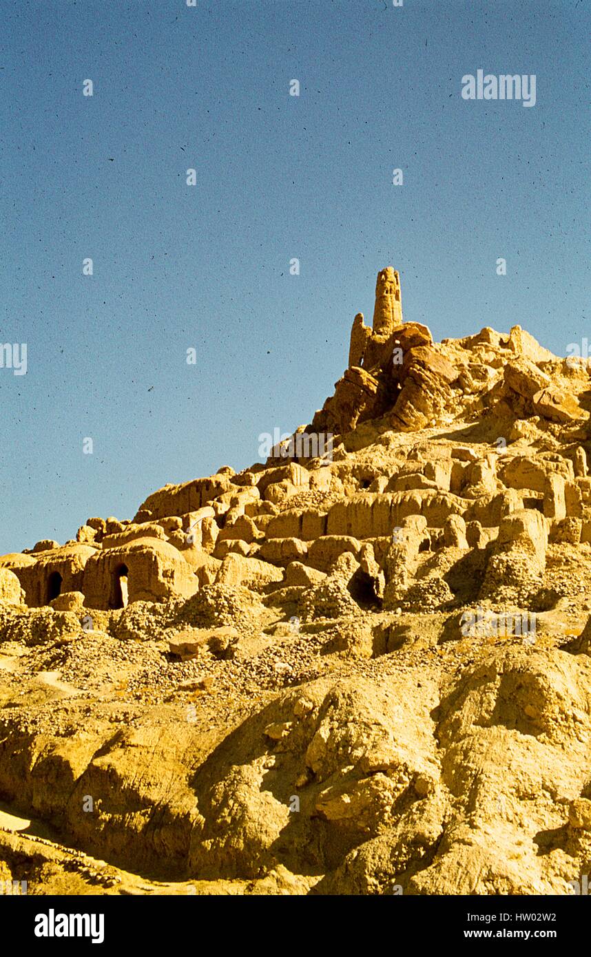View of an early temple's crumbled ruins in tne Bamiyan Valley, located in the Hazarajat region of central Afghanistan, November, 1975. Stock Photo
