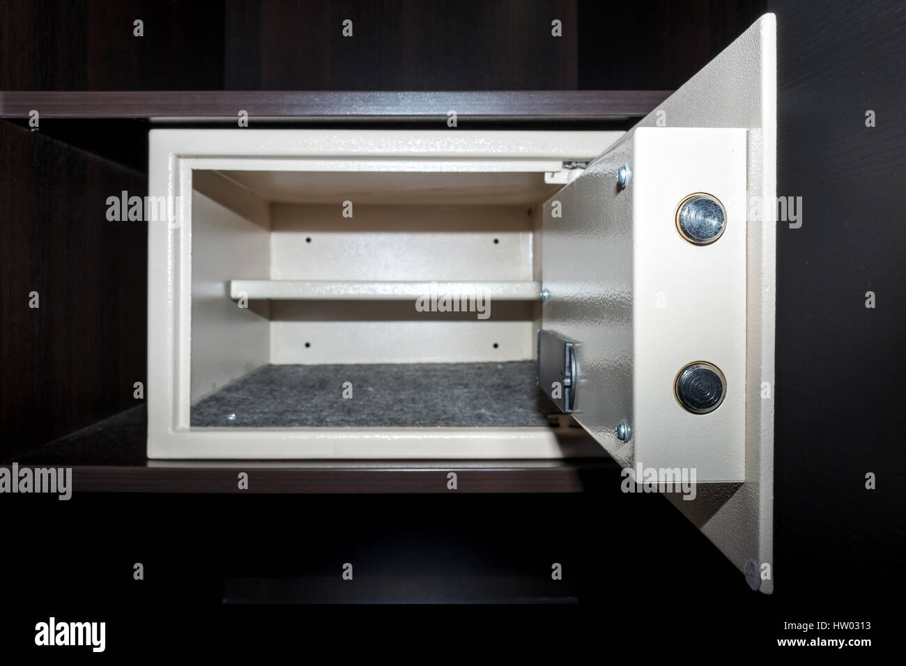 open and empty safe in hotel room Stock Photo