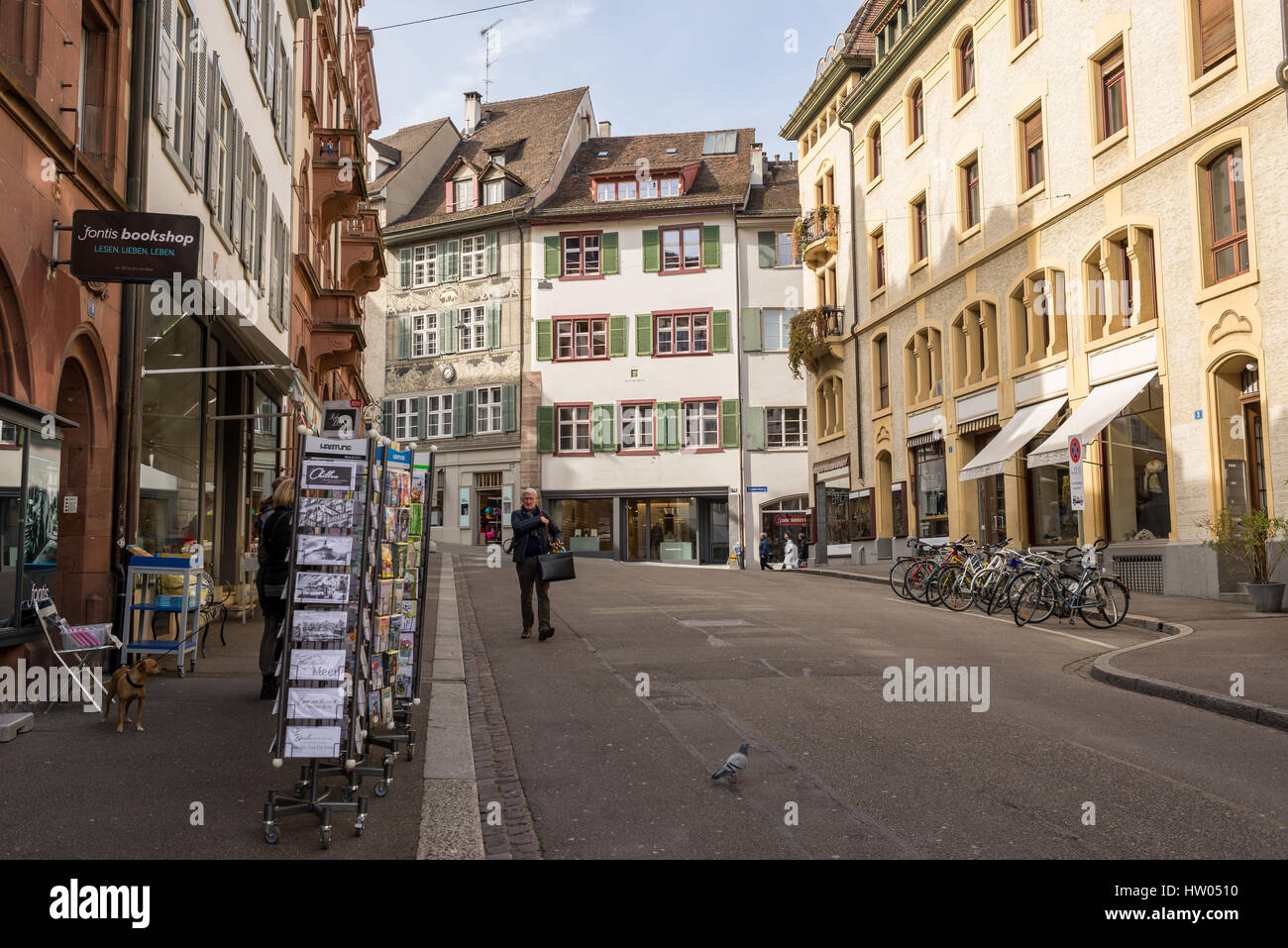 Man walking in Schnabelgasse in Basel old town city center also called Altstadt Grossbasel, Switzerland. Stock Photo