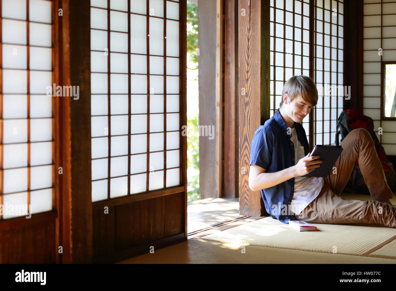 Caucasian man in traditional Japanese house Stock Photo