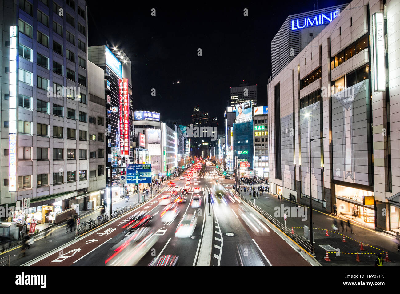 TOKYO , JAPAN - JANUARY 3, 2017 : Shinjuku, Tokyo, Japan. January 3, 2017 Street life, light trails and Billboards in Shinjuku's Kabuki-cho at Night. Stock Photo