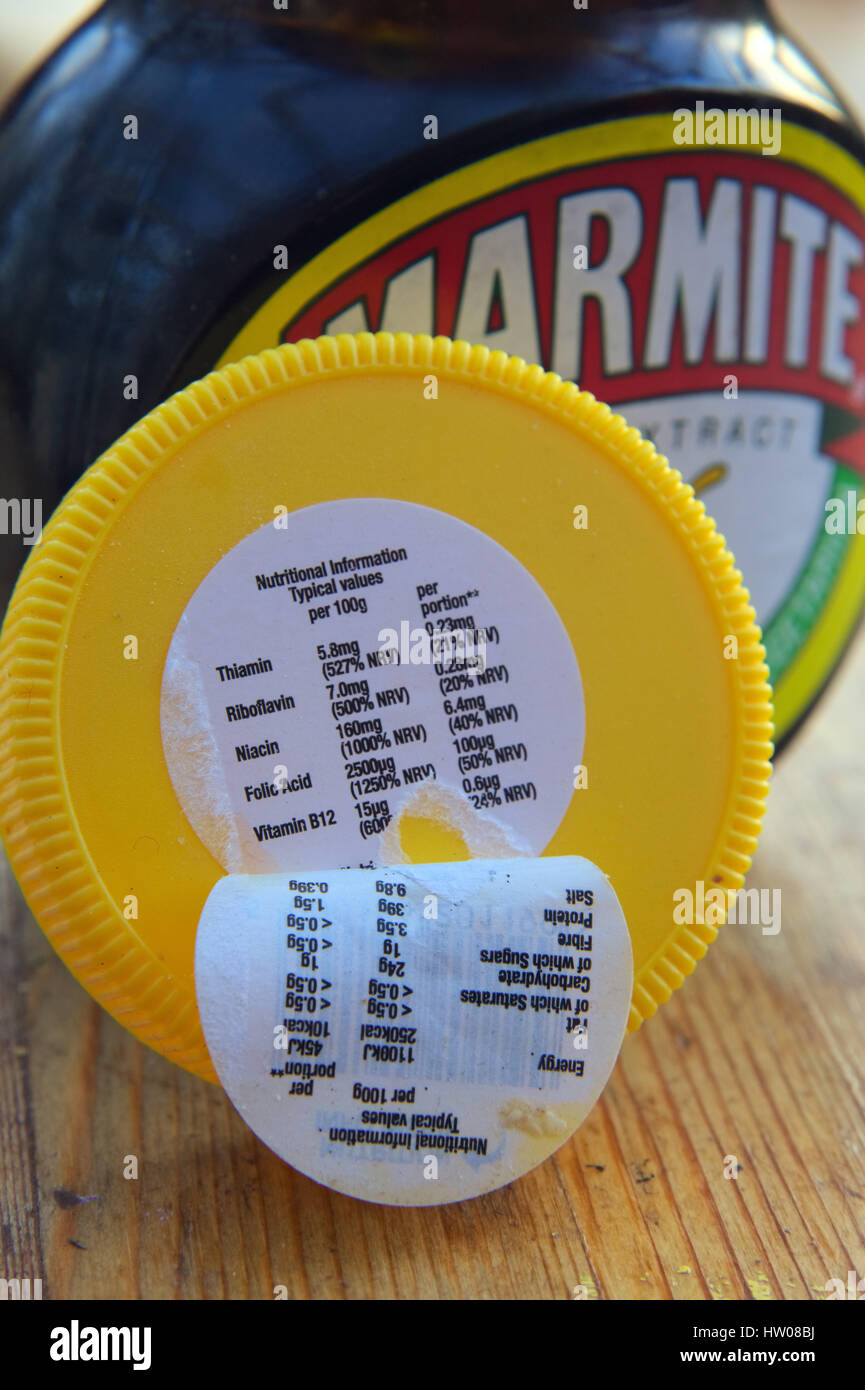 Nutrition information on Marmite is concealed under label on lid in very small print - and reveals high salt 9.8g/100g Stock Photo