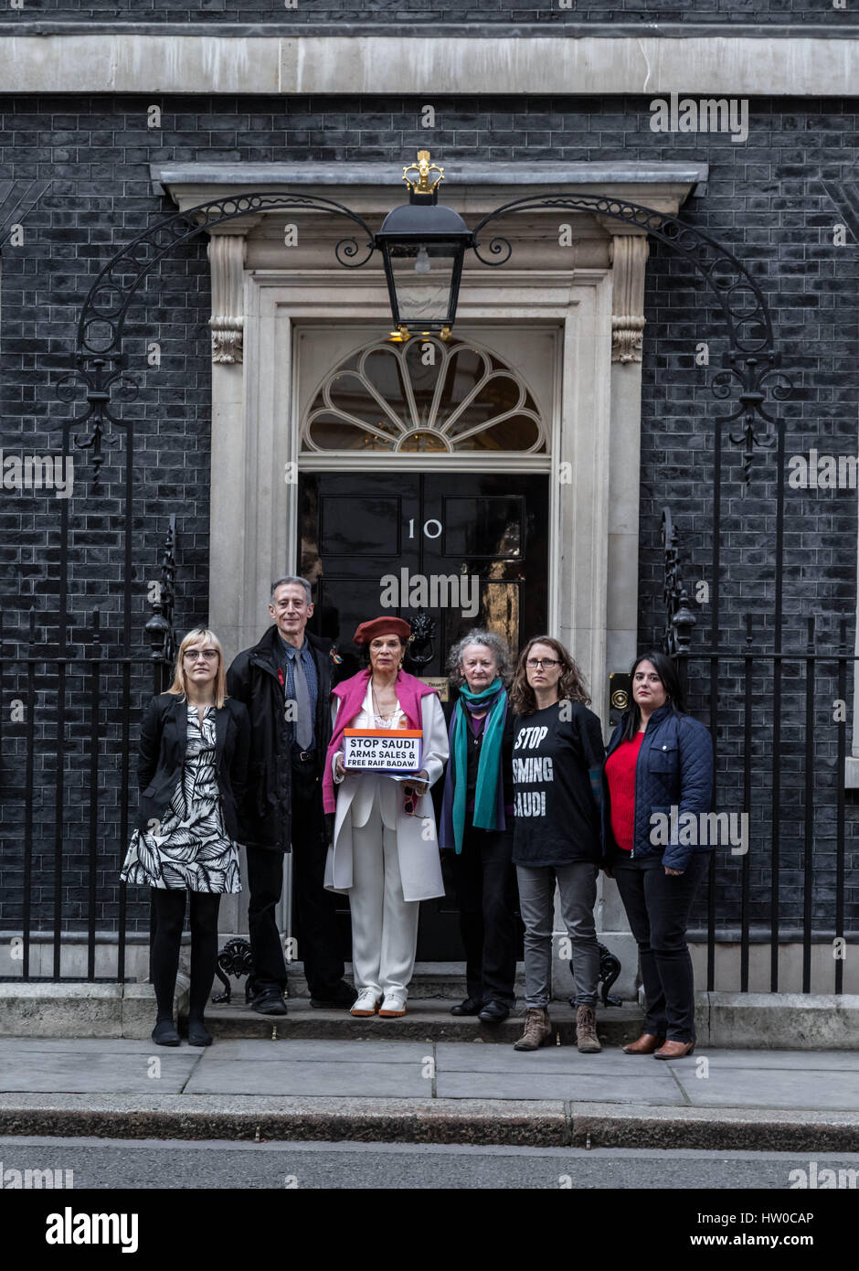 London, UK. 15th Mar, 2017. Bianca Jagger joins Human Rights campaigner Peter Tatchell with Green Party's Jenny Jones to hand in a 159,000-signature petition to Prime Minister Theresa May at 10 Downing Street. The petition, organised by Peter Tatchell, urges the UK government to halt arms sales to Saudi Arabia over its war crimes to Yemen and its jailing of blogger Raif Badawi and other political prisoners. Credit: Guy Corbishley/Alamy Live News Stock Photo