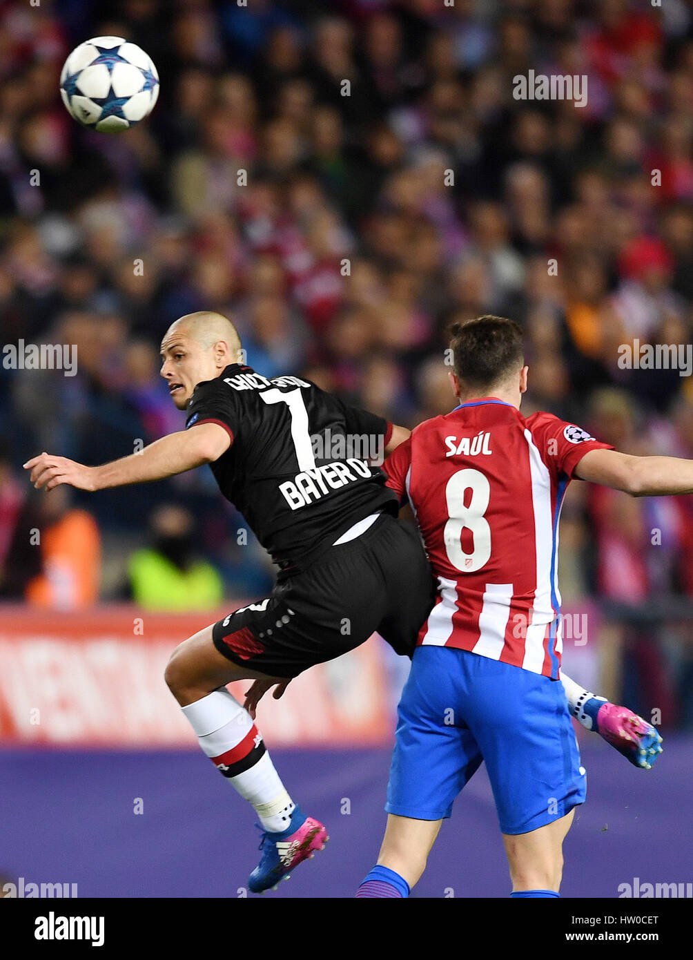 Madrid, Spain. 15th Mar, 2017. Madrid's Madrids Saul Ñiguez (r) and Javier Hernandez from Leverkusen in action during the Champions League knock-out round of 16 match between Atlético Madrid and Bayer Leverkusen the Vicente Calderón stadium in Madrid, Spain, 15 March 2017. Photo: Federico Gambarini/dpa/Alamy Live News Stock Photo