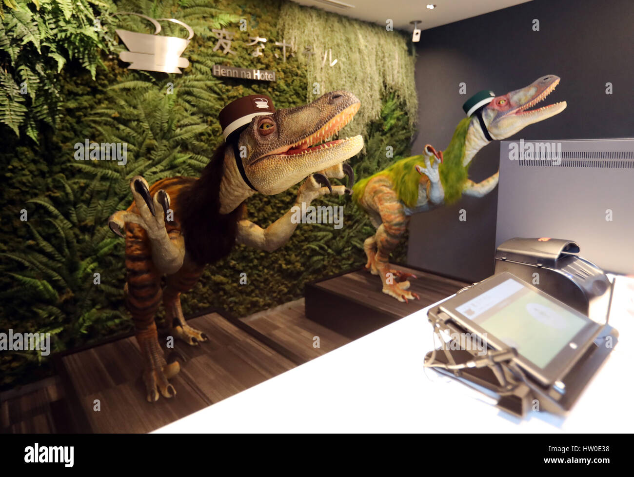 Tokyo, Japan. 15th March 2017. Urayasu, Japan. 15th Mar, 2017. Dinosaur robots greet guests at a reception of the newly opened 'Henn na Hotel' (Strange hotel) near Tokyo Disney Resort in Urayasu, suburban Tokyo on Wednesday, March 15, 2017. Japan's travel agency H.I.S runs the Henn na Hotel which has only seven human employees while nine types 140 robot staffs work at the 100-room six-storey hotel. Credit: Aflo Co. Ltd./Alamy Live News Stock Photo