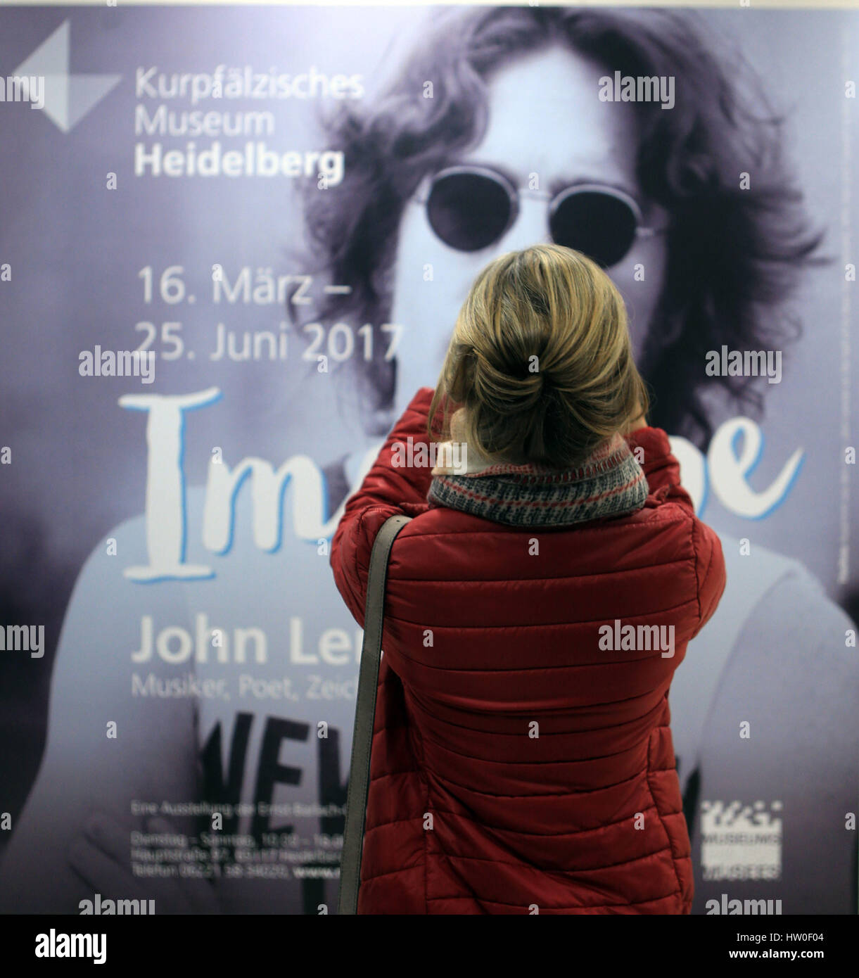 Heidelberg, March 15. 25th June, 2017. A woman visits the exhibition 'Imagine John Lennon' at the Kurpfaelzische Museum in Heidelberg, Germany, on March 15, 2017. Opened on Wednesday the exhibition will last to June 25, 2017. Credit: Luo Huanhuan/Xinhua/Alamy Live News Stock Photo