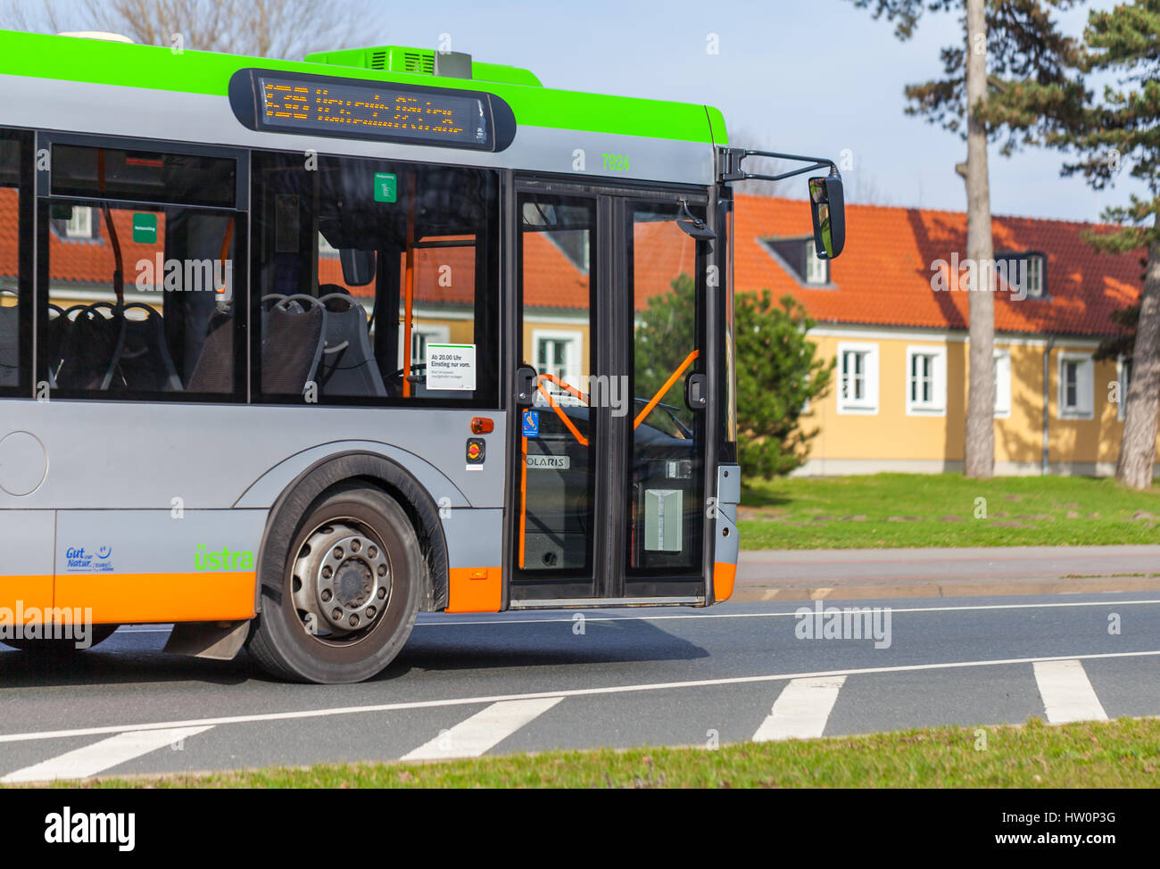 HANNOVER / GERMANY - MARCH 12, 2017: regular bus from UESTRA drives on route to the next stop. UESTRA is the operator of public transport in the city  Stock Photo